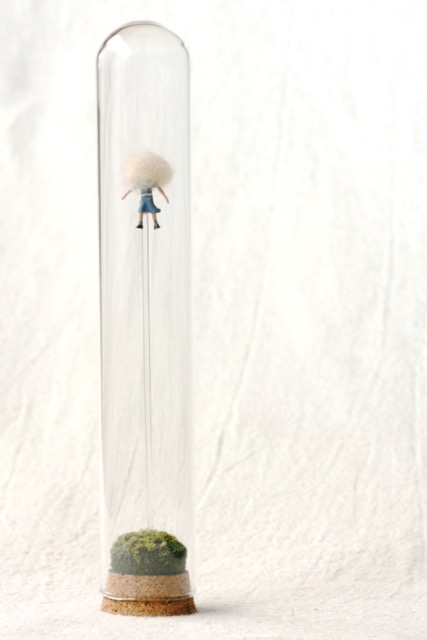 city of dreamers approx: 6” tall x 1” diameter
